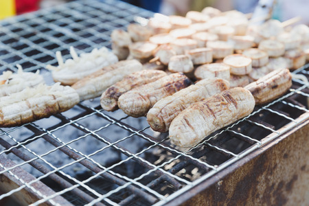 Grilled bananas on rack on stove, dessert in Thailandの写真素材