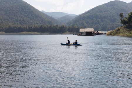 Chiang Mai, Thailand - December 27, 2016:  Tourists kayaking on lake in the mountains at Mae Ngad Dam and Reservoir in Chiang Mai, Thailand on December 27, 2016のeditorial素材
