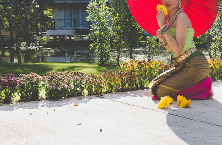 Thai woman wearing typical Thai dress, identity culture of Thailandの写真素材