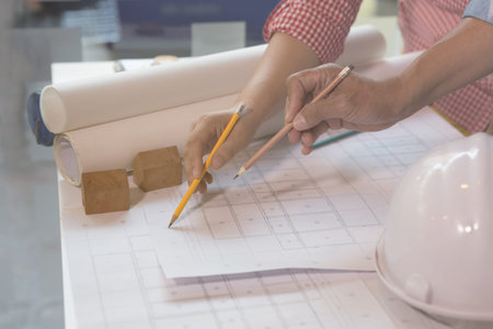 engineer meeting for architectural project, working with partner and engineering tools at workplace....