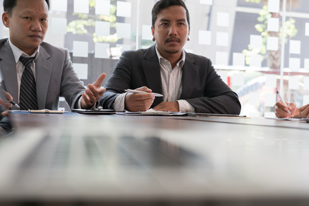 young business people having a meeting in office. businessman working together. Conference, discussion, teamwork, collaboration, corporate concept.の写真素材