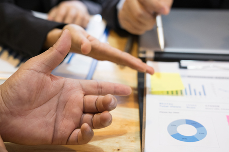 young business people having a meeting in office. businessman and businesswoman working together at workplace. Conference, discussion, teamwork, collaboration, corporate concept.の写真素材