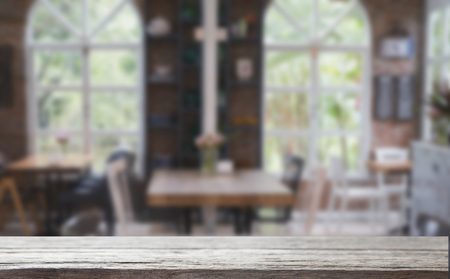 table and chair in food court, cafe, coffee shop, cafeteria, restaurant interior with wood table for montage or display your productの写真素材