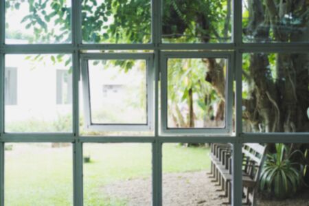 window with garden view. blur image for backgroundの写真素材