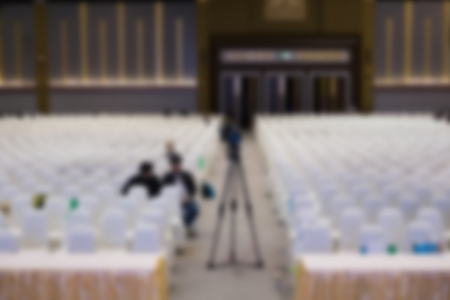 modern conference hall interior with white chairs. seminar room with empty seat. business event concept. blur for backgroundの写真素材