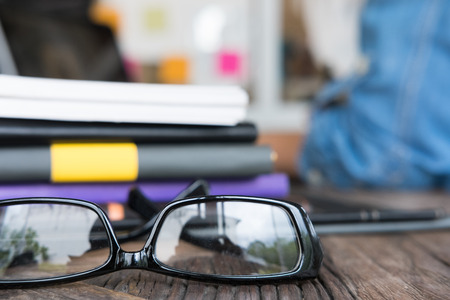 business people working with computer at workplace. young woman planning start up project at creative office. photographer retouching photo with laptop.の写真素材