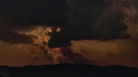 colorful dramatic twilight sky with sunray light and cloud at dawn, sunrise, sunset
