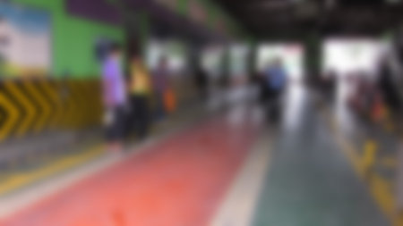 auto mechanic checking car. technician fixing engine in garage, automobile repair service. blur image for backgroundの写真素材