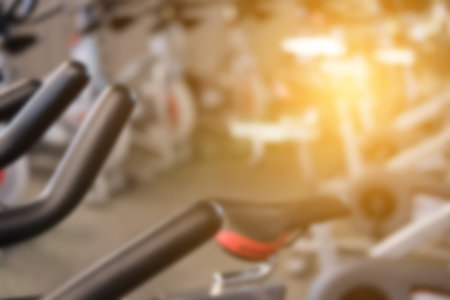 fitness facility center, gym interior, health club with sports training equipment for aerobic...