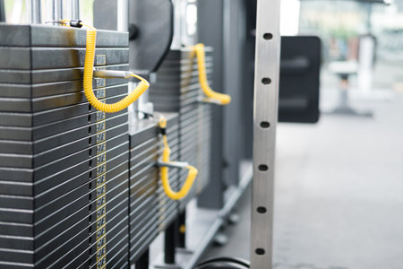 fitness facility center, gym interior, health club with sports training equipment for aerobic...