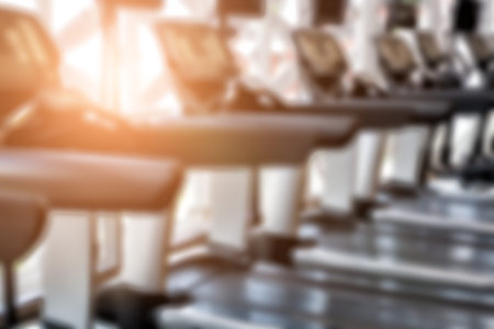 fitness facility center, gym interior, health club with sports training equipment for aerobic...