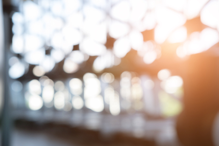 fitness facility center, gym interior, health club with sports training equipment for aerobic exercise workout and bodybuilding, blurry defocused backgroundの写真素材