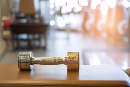 silver dumbbell in gym or health club. sport,  training, fitness lifestyle conceptの写真素材