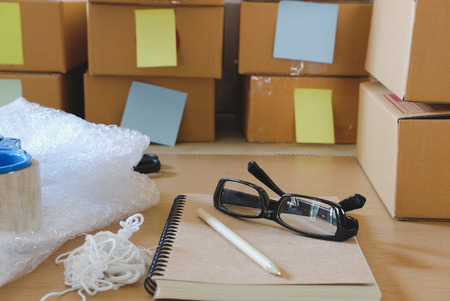 notebook, packing accessorie at workplace of startup small business owner.の写真素材