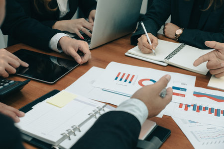 young business people having a meeting. businessman & businesswoman working with financial chart...