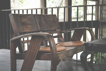 wooden bench chair in living room on mezzanine in houseの写真素材