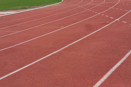 lane number & red running racetrack, backstretch in outdoor sports stadium arena