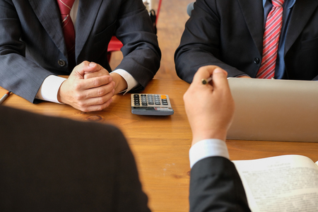 business adviser discussing idea. professional investor have a meeting. businessman working on new startup project with co-worker team.の写真素材