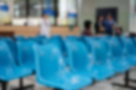 blue chair in in hospital. patient seat in waiting area in clinic. blur background