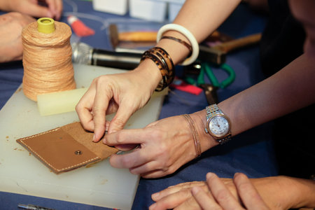 craftsman making leather bag. handmade DIY handicraft workshop