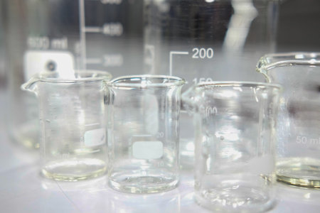 scientific chemical laboratory beaker glassware. science research & development