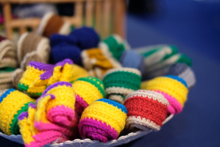 colorful knitted belt. knitting fabric strap. handmade handicraft embroidery accessoryの写真素材