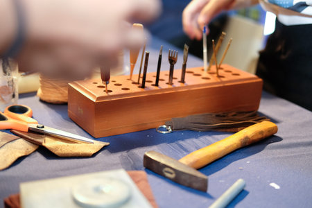 handmade leather craft DIY instrument tool. craftsman working desk
