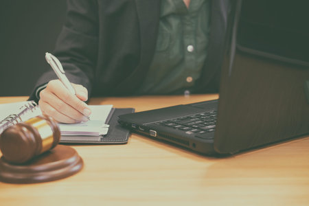 lawyer judge attorney justice working writing note at court. legal law gavel at courtroom.