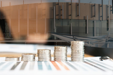 coins stack & business growth. businessman working at workplaceの写真素材