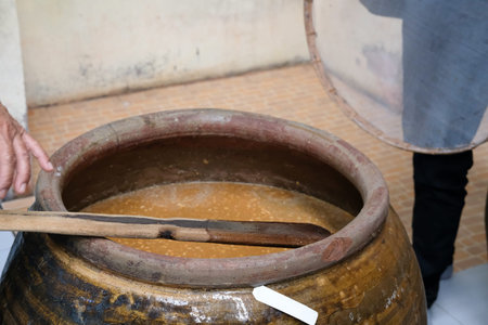 salted soybean paste fermented in jar. soy production