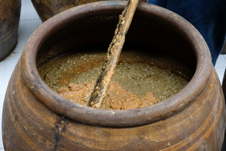 salted soybean paste fermented in jar. soy production