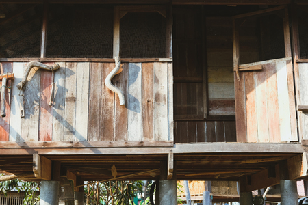 traditional wooden cottage hut home house in Thailandの写真素材