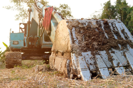 excavator backhoe digger tractor at construction site
