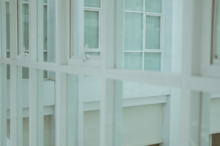 row of white awning aluminium push office windowの写真素材