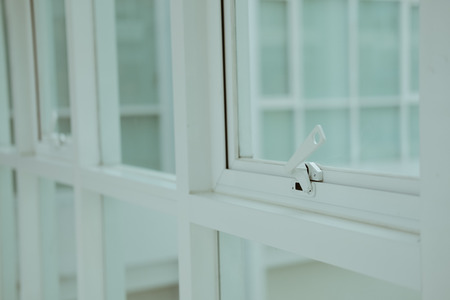 row of white awning aluminium push office windowの写真素材