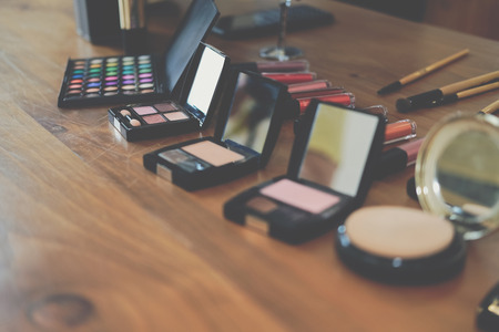 beauty cosmetic makeup essentials on stylish artist tableの写真素材