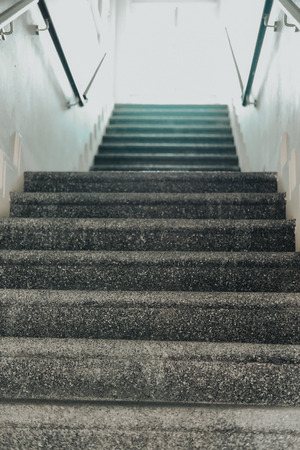 stairs stairway staircase leading up to lightの写真素材