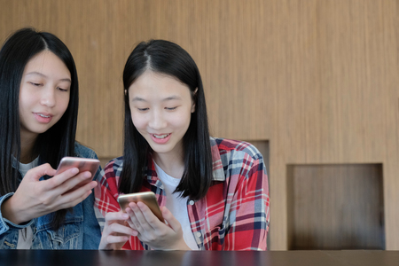 woman girl teenager using smart mobile phone. teenage lifestyleの写真素材