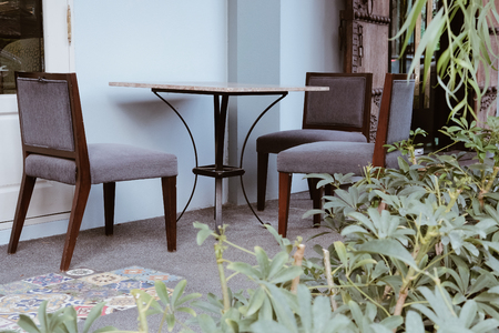 chair & table on terrace patio  in gardenの写真素材
