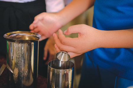 bartender preparing mocktail beverage at bar restaurant