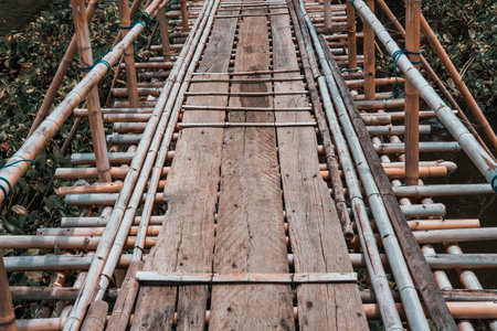 wooden bridge footbridge walkway pathway crossing river