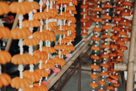 yellow flower candle for making worship merit to buddhaの写真素材