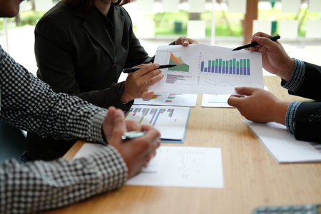 financial adviser discussing with investor. business people have a meeting. businessman working on...