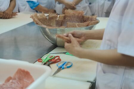 hand cooking dried grilled roasted baked crispy porkの写真素材