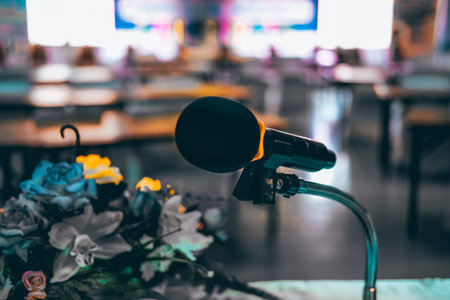 microphone in modern conference hall interior with white chairs. seminar room with empty seat. business event conceptの写真素材