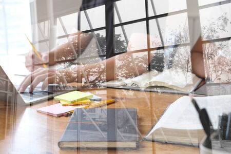 man studying design lesson with graphic tablet. college student learning online taking noteの写真素材