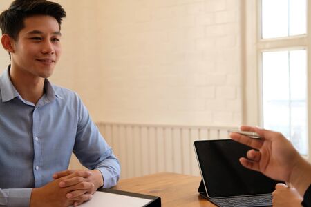 human resource manager interviewing candidate for job vacancy. applicant explaining profile for career recruitmentの写真素材