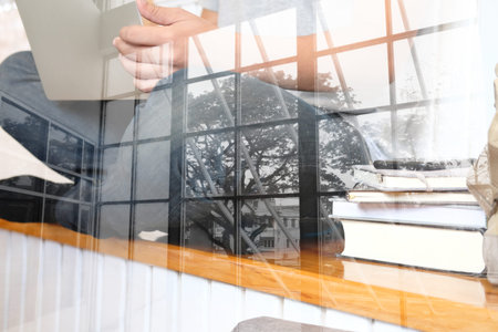 man college student  studying learning lesson with computer online. startup working at cafe coffee shopの写真素材