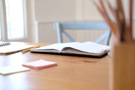 notebook stationary on library desk. back to school learning & education conceptの写真素材