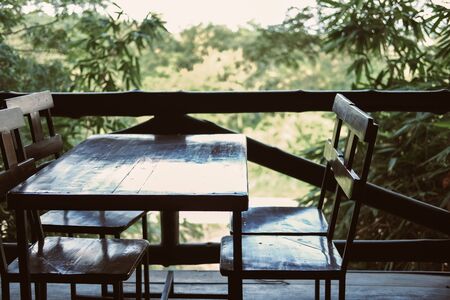 wooden chair in terrace balcony with garden view. living design for home interiorの写真素材